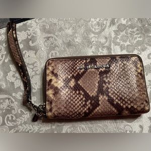 Snake print wristlet wallet. Slightly used